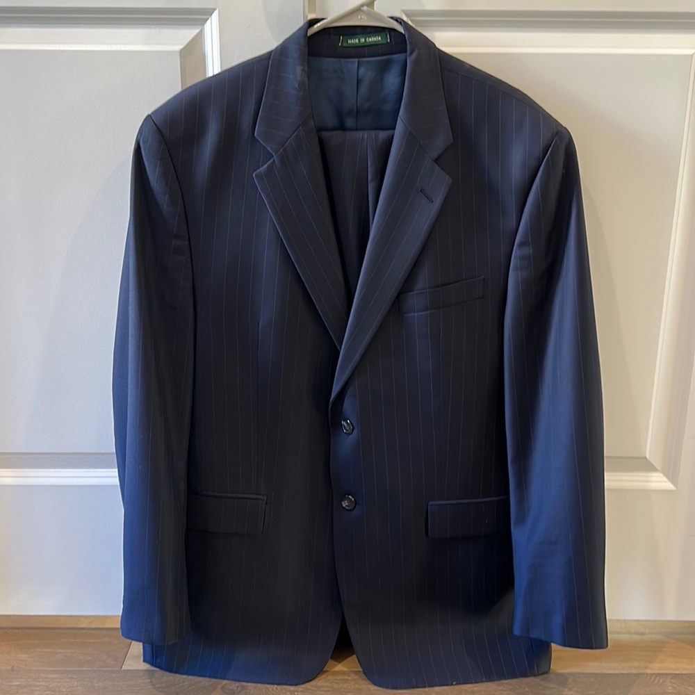 Ralph Lauren 2 button Navy pinstriped suit.  44R top. 35x32 cuffed pants